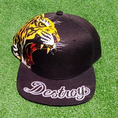 New, Mint Condition, And Unworn. Adult Unisex Adjustable Snapback One-Size-Fits-Most. Large Tiger's Head Graphic Print On The Left Side. Destroy Embroidered Onto The Top Brim. Quality Reason Design And Construction. Fitted Visor Hat For Streetwear, One Size Fits Most Fitted Visor Hat For Streetwear, Hip Hop Streetwear Fitted Hat, Casual Adjustable Snapback Hat With Graphic Print, Casual Adjustable Graphic Print Snapback Hat, Casual Adjustable Yellow Fitted Hat, Casual Yellow Adjustable Fitted Hat, Trendy Yellow Baseball Cap With Visor, Trendy Yellow Visor Baseball Cap