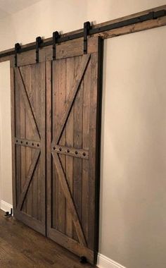 Menards Barn Door, Barn Door Au Barn Door, Barn Doors Front Of House, Dark Green Barn Doors, Barn Doors In Farmhouse, Howcto Build Barn Doors, Barn Tin Door, Shop Sliding Door Barns, 6ft Barn Door