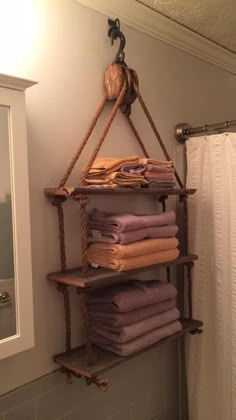 a shelf that has some towels on it