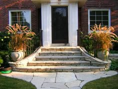 a house with steps leading to the front door