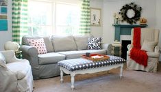 a living room filled with furniture and a fire place