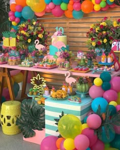 a colorful party with balloons and decorations