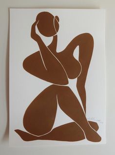 a brown and white painting of a naked woman