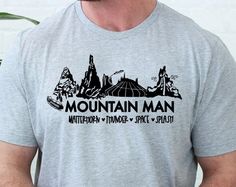 Peckshirt  Mountain Man Disney Shirt, Attractions Ride Shirt, Guys Disney Shirt, Disney Trip Shirt, Vacation Shirt, Men's Disneyland Disneyworld Shirt - Print In Your Way. Discover style and comfort with our versatile shirt collection. Crafted with premium materials, our shirts are designed to elevate your fashion game while ensuring a comfortable fit. Whether you're dressing up for a special occasion or keeping it casual, our shirts are the perfect choice. Explore a range of colors and patterns Disney Trip Shirts, Disney World Shirts, Summer Graphic Tee, Disney Shirt, Mountain Man, Mens Long Sleeve Tee, Travel Shirts, Vacation Shirts, Disney Shirts