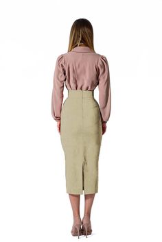 This chic Champagne Gold Cotton Midi Skirt is a fashionable and timeless piece crafted with premium cotton fabric. Perfect for formal and semi-formal occasions, the skirt has a flattering midi length and an effortless fit. Embody timeless sophistication and look great for any special event. Product Features Please Compare your Measurements To our Size Chart Before Purchase Fully Lined Fitted waist Center back seam with invisible zipper Regular fit- true to size Skirt Length is 30 Inches from Wai