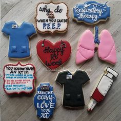 decorated cookies are arranged in the shape of heart, shirt, and t - shirt