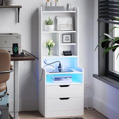 an office with a desk, chair and bookcase in it's center area