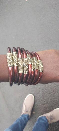 *Listing is for 10pcs bracelets *bracelets are made in Kenya with aluminium coated metal then finished with brass twisted  *they are adjustable to fit all sizes *handmade in Kenya  *wholesale prices available *shipping through dhl Express African Bracelets, Bracelets Men, Brass Bracelet, Men Jewelry, Metal Bracelets, Dhl Express, Kenya, Bracelets For Men, Cuff Bracelets