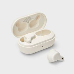 an earbud case is open to show the inside