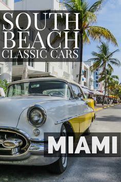 an old car is parked on the side of the road with palm trees in the background