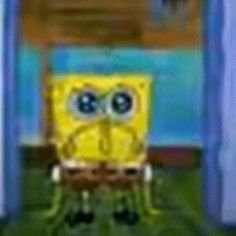 an animated spongebob sitting in front of a door with his eyes wide open