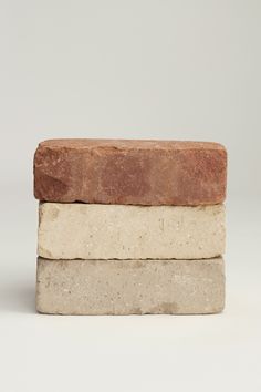 three stone blocks stacked on top of each other