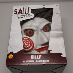 a box that has a mask on it with the words billy in red and white