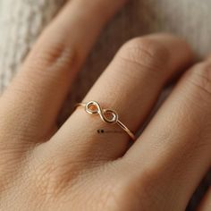 14K Gold Plated Infinity Ring, Delicate Love Ring, Dainty Gold Ring , Forever Ring, Infinity Promise Ring ,Infinity Shape Ring, Symbol Ring  💙ITEM DETAILS💙 ♥️ Item :   Infinity Ring ♥️ Material: 925 Sterling Silver ♥️ Size: Select the Variations ♥️ Stone: No                                               CUSTOME DESIGN JEWELS ♣️ NOTE:- Product color may be some different due to photographic lighting sources or your monitor setting. ♣️ Product & gemstone weight may vary from actual products. ♣️ Infinity Gold Ring, Infinity Midi Rings For Anniversary, Anniversary Infinity Midi Rings, Dainty Infinity Midi Rings For Gift, Dainty Infinity Midi Rings As Gift, Hypoallergenic Infinity Promise Ring, Infinity Rings With Simple Design For Anniversary, Dainty Infinity Stackable Rings For Gift, Dainty Infinity Stackable Rings As Gift