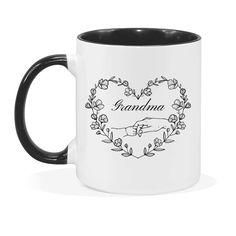 a black and white coffee mug with the words grandma on it in a heart shape