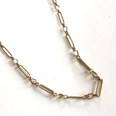 Minimum order is $10.00 - Prior to shipping charges. A gorgeous brass statement chain that's hand made and can be oxidized or plated. This style is similar to my Wyatt Chain. Not soldered, easy to open and close for your desired lengths. The largest link measures 22mm x 5.5mm x 1.2mm square wire. 1 Order = 2 Feet, If you order multiple orders, you'll receive one continuous piece. Here are some similar styles: Corey Chain https://www.etsy.com/listing/191000587/vintage-corey-chain-heavy-brass-chai Everyday Silver Brass Chain Necklace, Brass Jewelry With Oval Link Cable Chain, Silver Brass Chain Link Necklace, Silver Chain Link Necklace In Brass, Gold Metal Box Chain Necklace, Bronze Brass Chain Jewelry, Antique Gold Metal Chain Necklace As Gift, Antique Gold Metal Chain Necklace For Gift, Bronze Brass Jewelry With Chain