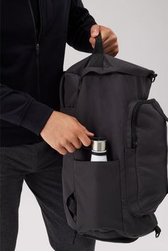 From the office to the gym—and personal item to carry-on—this reinforced canvas backpack seamlessly transforms into a spacious duffle. It features a dedicated shoe compartment, a padded laptop sleeve, and accessible pockets (for your most reached-for items). Mack Weldon offers the best and most comfortable premium clothing for anything from working out to casual living. Our incredibly soft and smooth fabric will change your outlook on men's clothing. Come see why we are the one of the top luxury Functional Backpack With Luggage Sleeve, Practical Everyday Duffle Bag With Functional Pockets, Everyday Practical Duffle Bag With Functional Pockets, Functional Everyday Backpack, Everyday Duffle Bag Backpack With Functional Pockets, Sporty Canvas Gym Bag, Functional Outdoor Travel Bag With Anti-theft Pocket, Functional Travel Bag With Anti-theft Pocket For Outdoor, Functional Backpack With Luggage Sleeve For Outdoor Activities