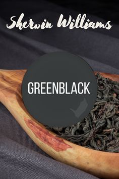 greenblack tea in a wooden bowl with the words sherrin williams on it