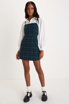 You'll always cherish the days you spend in the Lulus Sweetest Memory Navy Plaid Lace-Up Mini Dress With Pockets! This sturdy, woven mini dress has an allover navy blue and green plaid pattern across its straight neckline, A-line silhouette, and long straps that lace up and tie at back. Diagonal front pockets. Hidden back zipper/clasp. Fit: This garment fits true to size. Length: Mid-thigh. Size medium measures 26.5" from adjustable straps to hem. Bust: Great for any cup size. Waist: Fitted - ve Blue And Green Plaid, Lulu Fashion, Adhesive Bra, Straight Neckline, Sweet Memories, Dress With Pockets, Green Plaid, Cup Size, Blue And Green