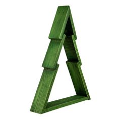 a green wooden triangle shaped object on a white background