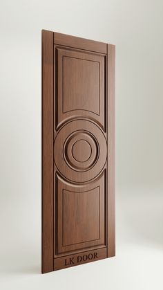 the door is made out of wood and has a circular design on it's side