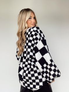 Take your look to the next level with the Not Your Pawn Sweater. Crafted with a v-neckline, checkered pattern, and relaxed oversized fit, this timeless knit is the perfect combination of comfort, warmth, and style. The luxurious fabric is stretchy and soft, offering a cozy feel that will keep you looking fashionable during every brunch date and shopping trip this fall. Elevate your wardrobe with a statement piece that is versatile and timeless. 100% Polyester Hand wash cold. Brunch Date, Checkered Pattern, Shopping Trip, Luxury Fabrics, Dream Wardrobe, Dresses Xs, Next Level, Fashion Inspiration, Dream Closet