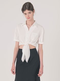 Editor's Notes This short-sleeve top is a trendy twist to a classic shirt blouse.  It is punctuated with a tie-up ribbon strap in the front for fun look.- Shirt blouse with collars  buttons  and front pocket- Wide tie-up ribbon strap in the front- Slightly puffed sleevesMeasurements(in.)S / M- Length: 16.54 in. / 16.93 in. - Shoulder: 15.35 in. / 15.75 in. - Bust: 36.61 in. / 38.19 in. - Waist: 32.28 in. / 33.86 in. - Sleeve: 9.45 in. / 9.64 in.*All measurements are Elegant Short Sleeve Tops For Office Wear, Casual Office Tops With Tie Sleeves, Casual Tie Sleeve Tops For Office, Elegant Short Sleeve Shirt For Office Wear, Formal Short Sleeve Tops For Office, Spring Workwear Puff Sleeve Top, Casual Shirt With Tie Sleeves, Chic Short Sleeve Shirt For Formal Occasions, Chic Short Sleeve Formal Shirt