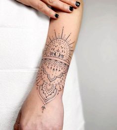 a woman's arm with a tattoo on it