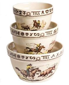 three bowls with cowboy images on them stacked in the shape of horses and cowboys are shown