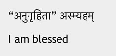 the words are in two languages, one says i am blessed and the other is