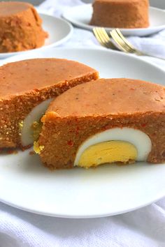 two slices of cake on a white plate