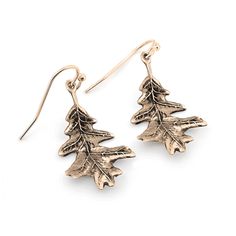 Available in White Bronze, Yellow Bronze, and Sterling Silver Ships worldwide. Earring Dimensions: 19mm x 13mm x 29mm White Oak Leaf, Oak Leaf Earrings, History Jewelry, Chevron Earrings, Bronze Earrings, Skull Pendant, Oak Leaf, Gift Card Sale, Leaf Earrings