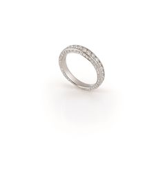 a white gold ring with diamonds on the sides and an open band in the middle