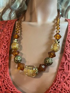 This beautiful necklace is made from resin beads. The colours are brown, beige and gold.  This lovely necklace is 25 inches in length. Gold Necklace With Large Beads As Gift, Large Bead Necklace, Lovely Necklace, Resin Beads, Beautiful Necklace, Brown Beige, Bead Necklace, Beaded Necklaces, Beautiful Necklaces