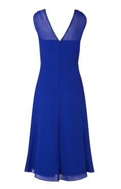 Bright, jewel like hues reign with our Cici dress in Cobalt Blue. Our elegant midi cut dress will smooth and flatter for a streamlined silhouette. The romantic loose cut bodice top has a demure sheer panel for added femininity while the flared skirt with gentle gathering gives added swish and sway after dark. Why not add a contrasting satin waistband for confident colour blocking? Details to love – Midi skirt, strapless bodice, subtle gathering. Elegant Royal Blue A-line Dress, Formal A-line Dress With Illusion Neckline, Blue A-line Chiffon Evening Dress, Blue Dress With Flattering Silhouette For Evening, Blue A-line Chiffon Dress For Wedding, Blue A-line Chiffon Wedding Dress, Formal Midi Dress With Sheer Bodice, Formal Sleeveless Midi Dress With Sheer Bodice, Elegant Midi Dress With Sheer Back