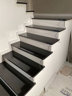 there is no image here to provide a caption for in this case, the stairs are black and white