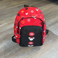 Brand Disney Style Mini Backpack, Looped Strap Allows For Crossbody Option Colors Red, Black, Yellow, & White Condition Nwot Offers Welcome! Mickey Mouse Travel Backpack, Minnie Mouse Travel Backpack, Mickey Mouse Standard Backpack For Disney Trips, Mickey Mouse Themed Backpack For Disney Trips, Casual Minnie Mouse Backpack For Disney Trips, Casual Mickey Mouse School Backpack, Casual Minnie Mouse Backpack For Travel, Mickey Mouse Backpack For Daily Use, Mickey Mouse Everyday Backpack