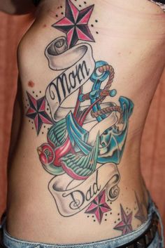 a woman with a tattoo on her stomach that says mom and has an anchor, starfish