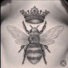 a bee with a crown on it's back is shown in black and white