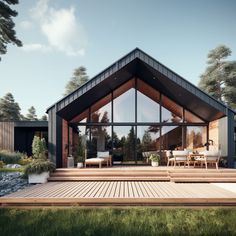 a wooden deck with chairs and tables in front of a large glass windowed house