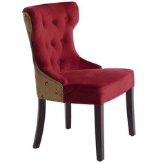 an upholstered red chair with gold details on the armrests and back