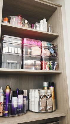 the shelves are filled with many different types of beauty products and containers for hair care