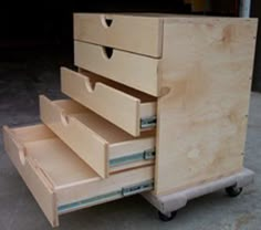 the drawers are open and ready to be put into the cart or moveable vehicle