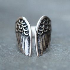 Angel Wing Ring Angel Ring Angel Jewelry Goth Gothic Silver Finger Ring Resizable Silver Metal Stainless Steel Women's Men's Jewelry Ring (Ring is Resizable/Adjustable) - High quality jewelry - Made to order - Handled with love *For any questions about the product please feel free to ask! (Keep shopping explore more of our collection within our store below) Angel Wings Ring, Wings Ring, Angel Wing Ring, Angel Ring, Angel Jewelry, Band Jewelry, Womens Wedding Bands, Stainless Steel Rings, Steel Ring