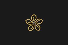 a black and gold flower logo