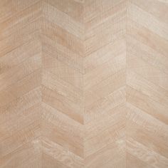 an image of wood flooring that looks like chevrons