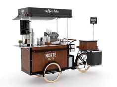 an ice cream cart with wheels is shown