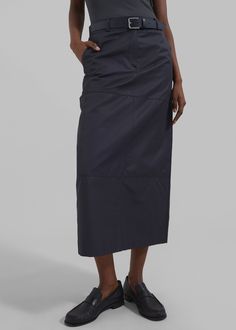 Color: Navy Midweight Regular fit Midi length Side pockets Belt loops Zip fly Hook and bar closure Lined 60% Cotton 40% Polyamide Dry Clean By The Frankie Shop. Imported Cargo Midi Skirt, The Frankie Shop, Frankie Shop, Cargo Skirt, Pocket Belt, Midi Length, Work Hard, Midi Skirt, Dry Clean