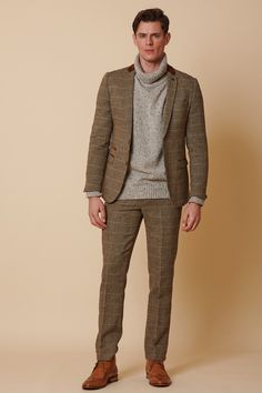 Its ability to carry colour and texture so well has made tweed a consistent fabric of choice through the centuries. This classic English heritage style gives a nod to bygones before us with its velvet trim collar and elbow patches. Ideal for attending a rustic country wedding, channelling Peaky Blinders or a day at the races. Looking for a plainer jacket? Check out the alternate Ted style. Models wears size 38R blazer & 32R trousers. Features Herringbone Slim fit Single-breasted Notch lapel Doub Timeless Tweed Jacket With Welt Pockets, Fall Tailored Tweed Jacket, Tailored Timeless Tweed Jacket, Timeless Brown Tweed Jacket With Welt Pockets, Timeless Tweed Jacket For Fall, Timeless Fall Tweed Jacket With Suit Collar, Timeless Fall Tweed Jacket, Brown Tweed Suit With Herringbone Pattern, Timeless Brown Suit For Fall