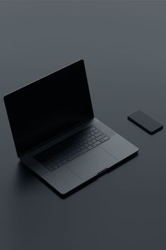 an open laptop computer sitting on top of a table next to a mouse and keyboard